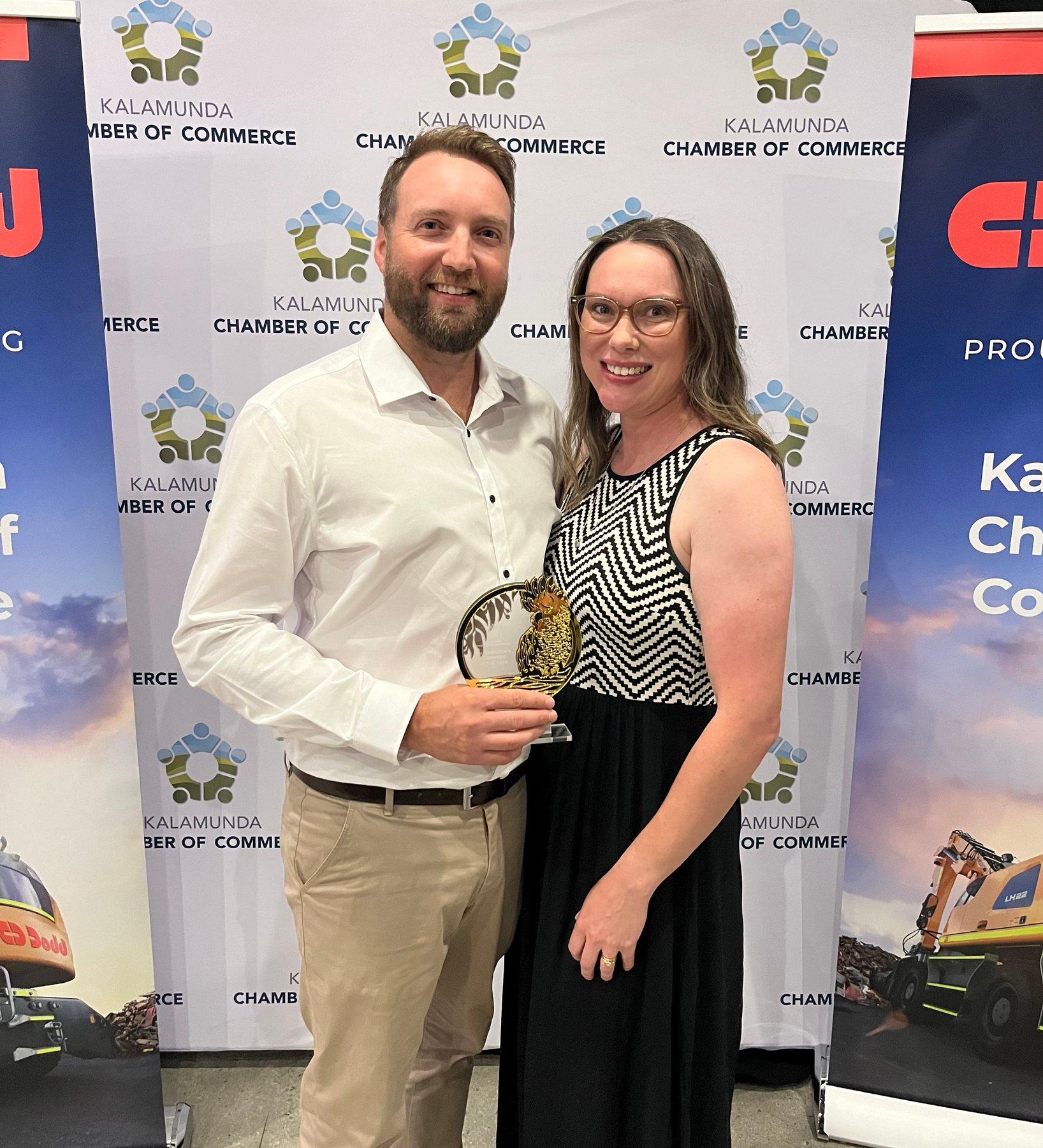 Matt and Caitlin Honey with the 2024 Kalamunda Chamber of Commerce Enterprise of the Year award