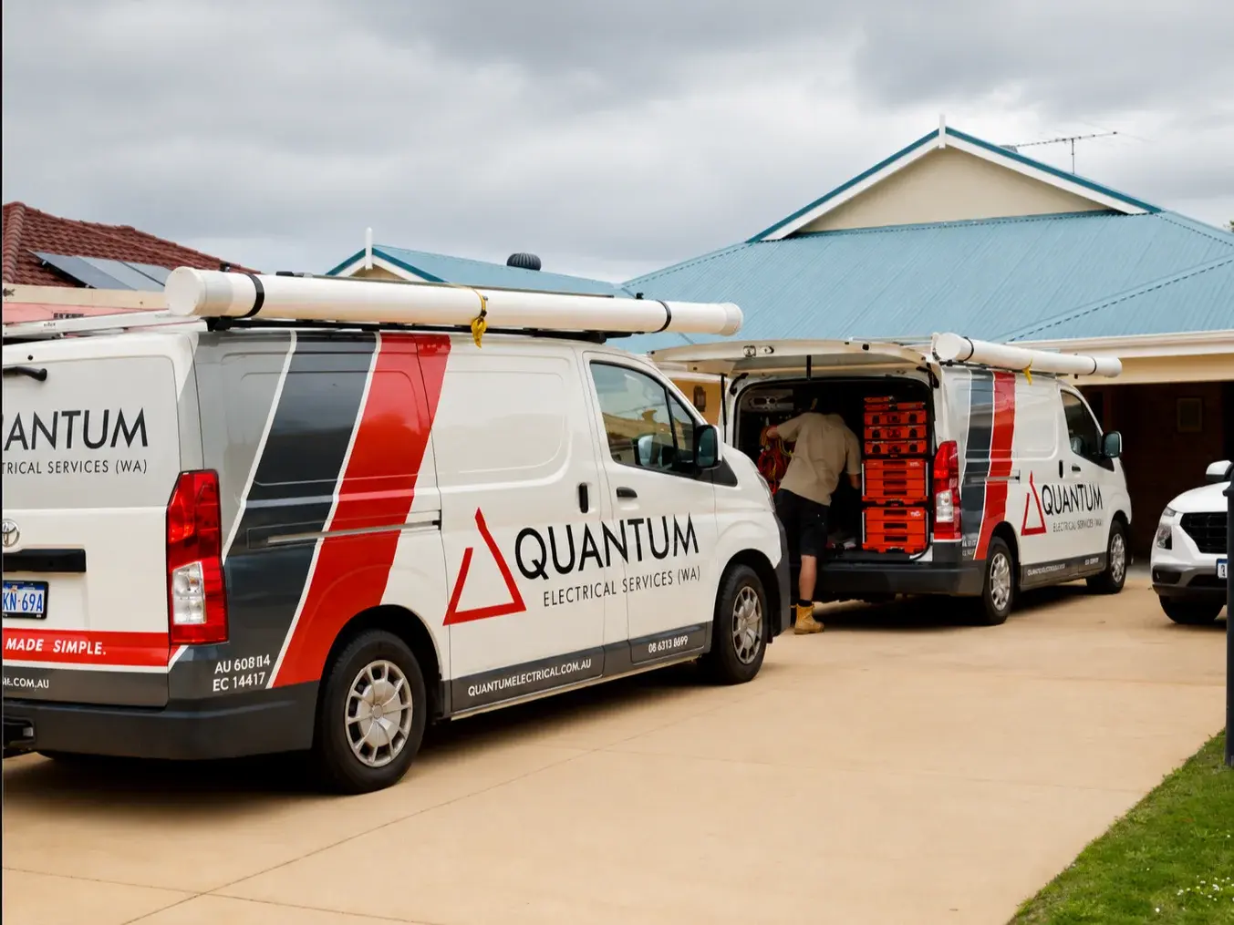 Aerial view of a Quantum van parked on a tree-lined Perth Hills driveway